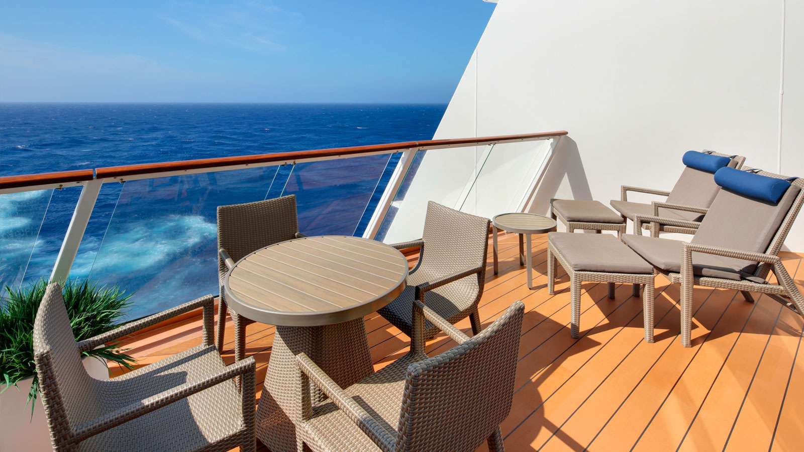 Spacious balcony with two chairs