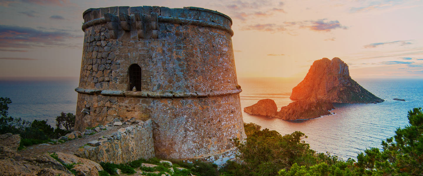 Vibrant Sunset View from Fortified Coastal Structure