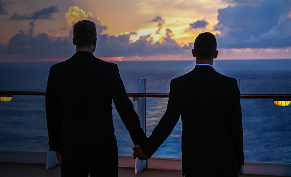 Gay Couple during a romantic cruise wedding.