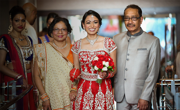 Bride with her family during a romantic wedding.
