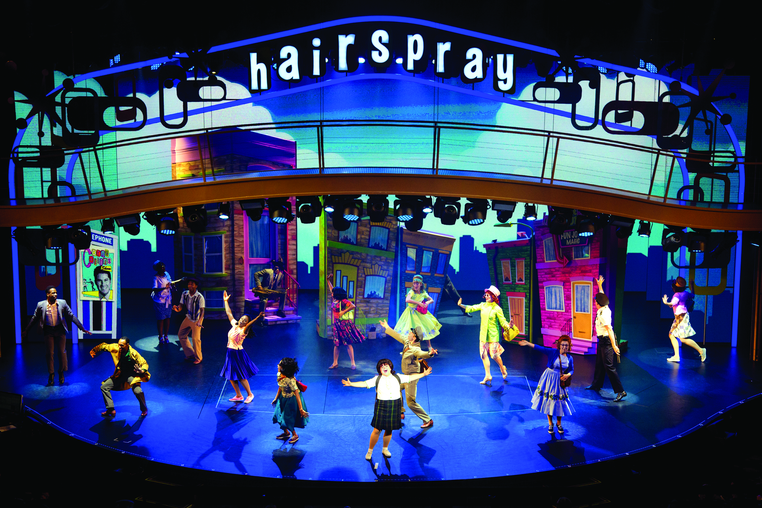 SY, Symphony of the Seas, Hairspray, Entertainment Place, performance, performers, Broadway, Play, Actress, Actor, Theater, Dancing, singing cast, singers, scenery, Hairspray signage lit up above stage, wide view of stage,