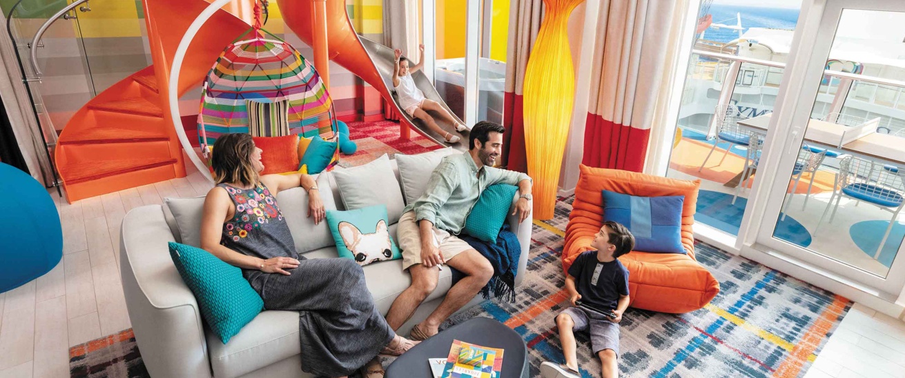Family lounging in the living room in the Ultimate Family Suite