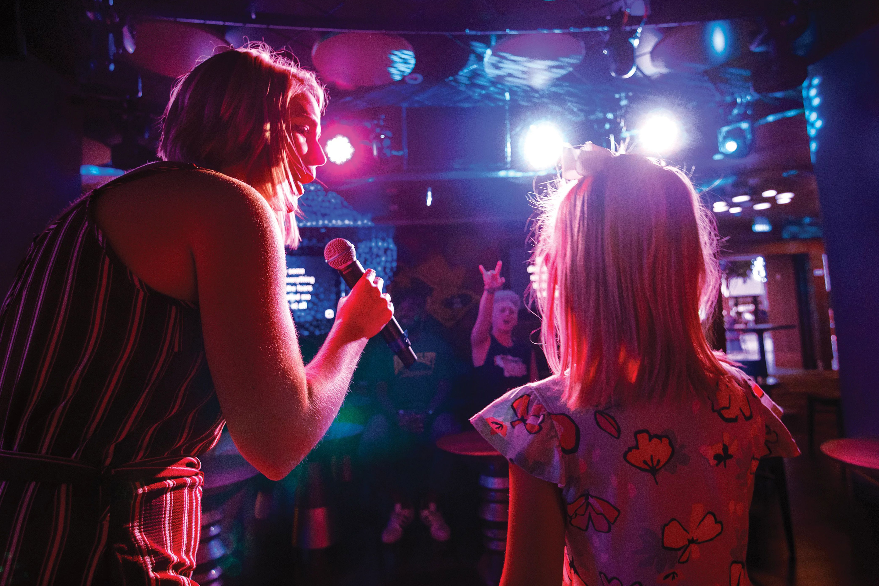Spotlight karaoke mother and daughter singing