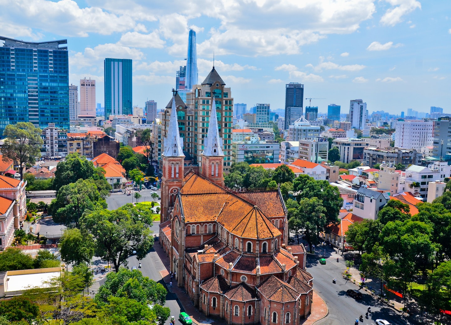 Aerial view of Saigon’s Notre-Dame Cathedral and skyline.