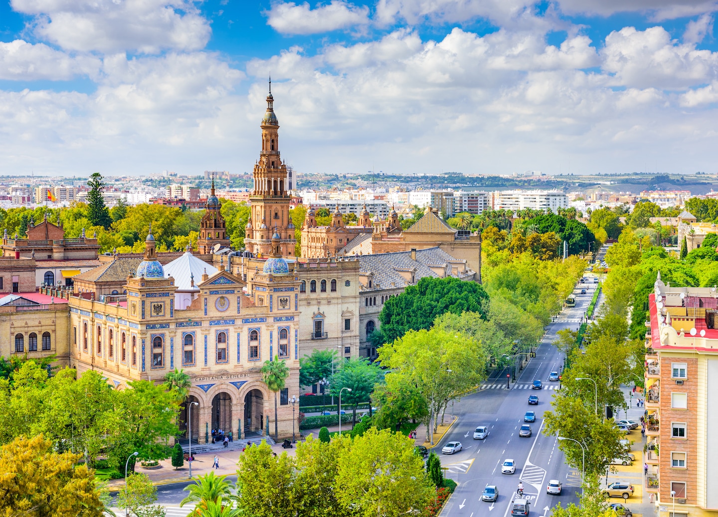 Plaza de España’s sweeping curves and ornate towers frame Seville’s grand, sunlit square. - Seville, Spain