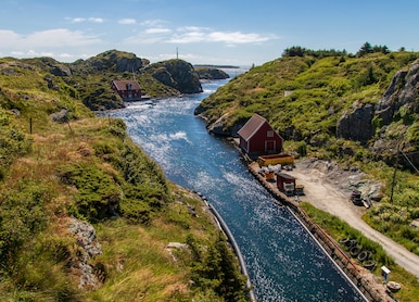 canal between the islands in the beautiful old fishing village rovaer in western norway