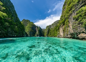 beautiful crystal clear water at pileh bay at phi phi island near phuket thailand