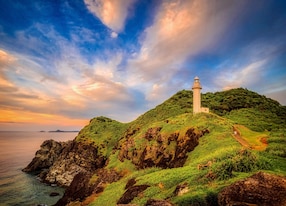 oganzaki lighthouse and coastline on ishigaki island okinawa japan
