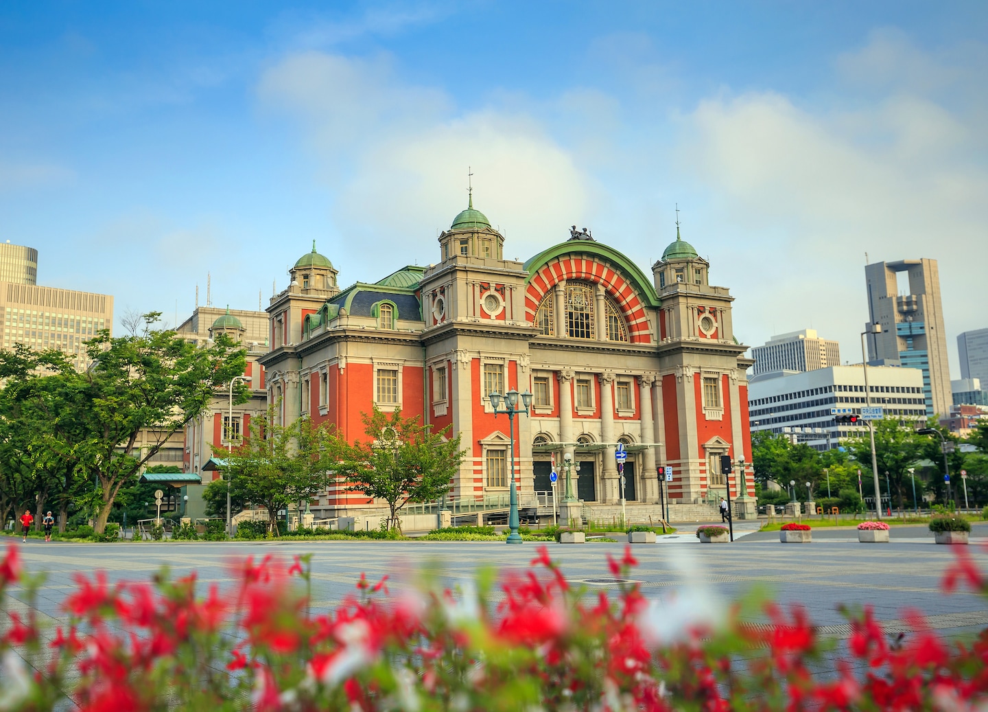 Osaka spring offers cherry blossoms, mild weather, hanami picnics, and festivals.