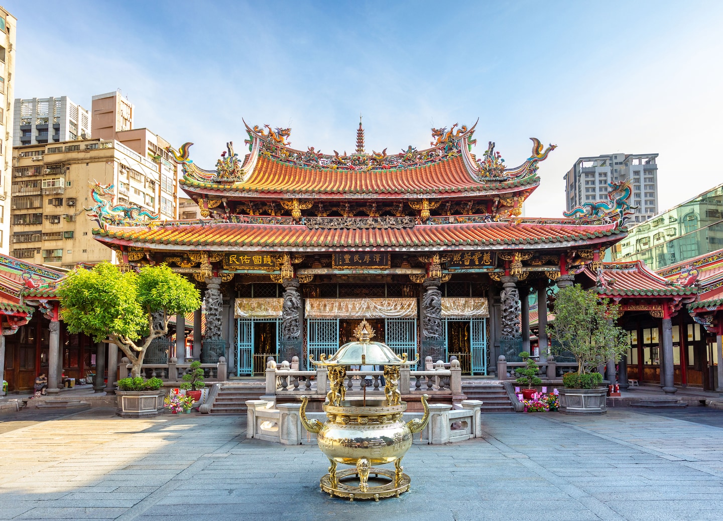 Longshan Temple’s ornate carvings and lanterns create a vibrant, spiritual landmark. - Taipei, Taiwan