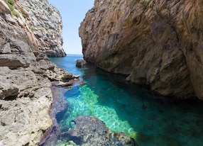 wied babu at wied iz zurrieq azure blue turquoise waters at the bottom of the valley next to the