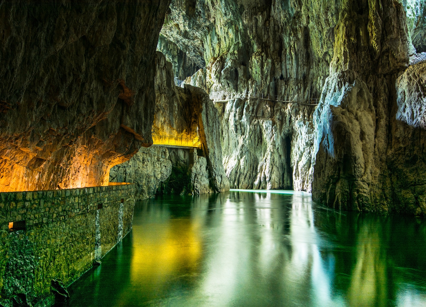 Škocjan Caves reveal vast limestone chambers shaped by centuries of underground river flow. - Koper, Slovenia