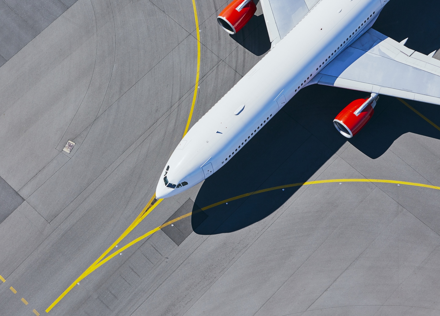 Airplane parked at airport terminal.