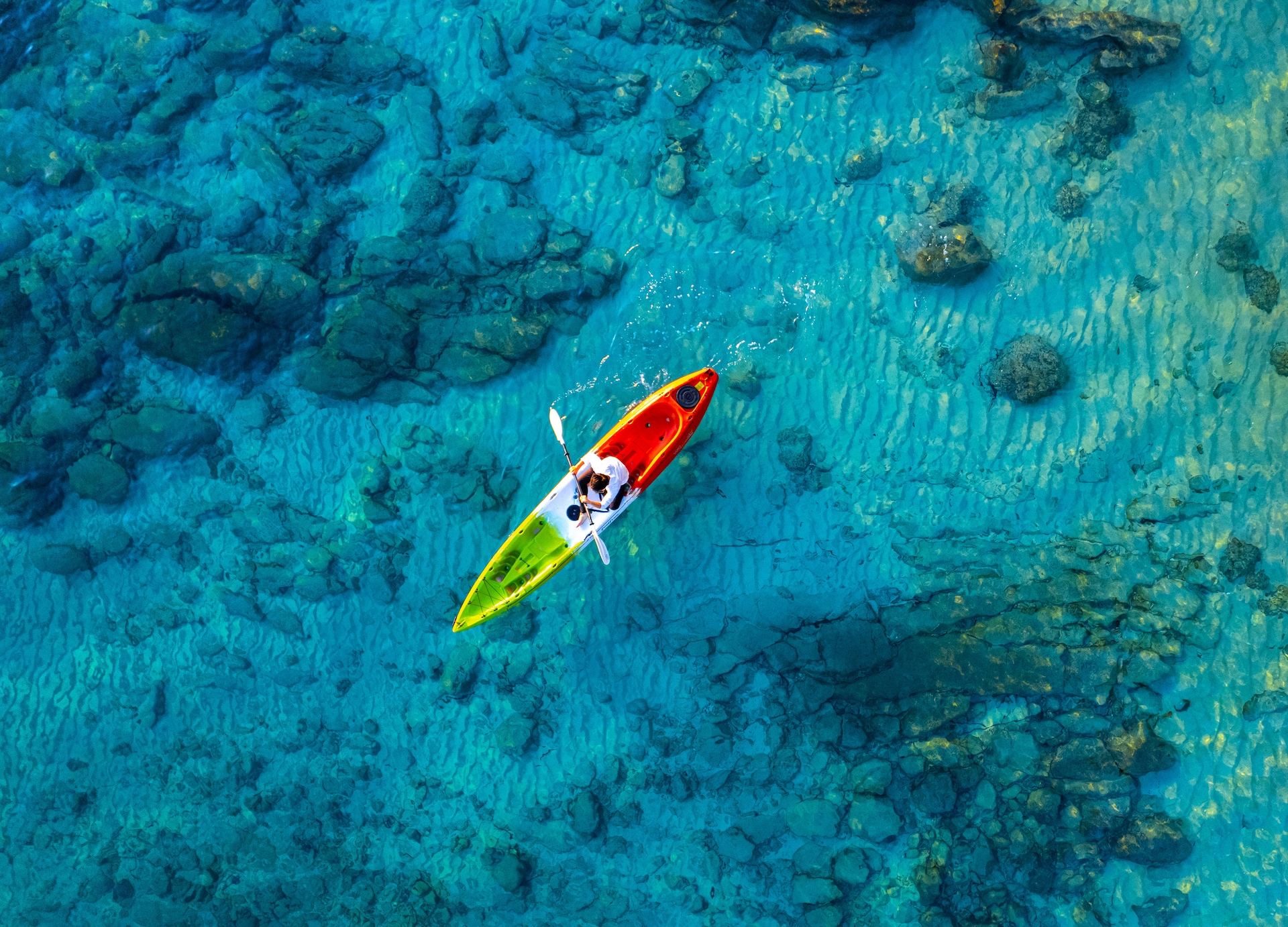kayak aerial clear water