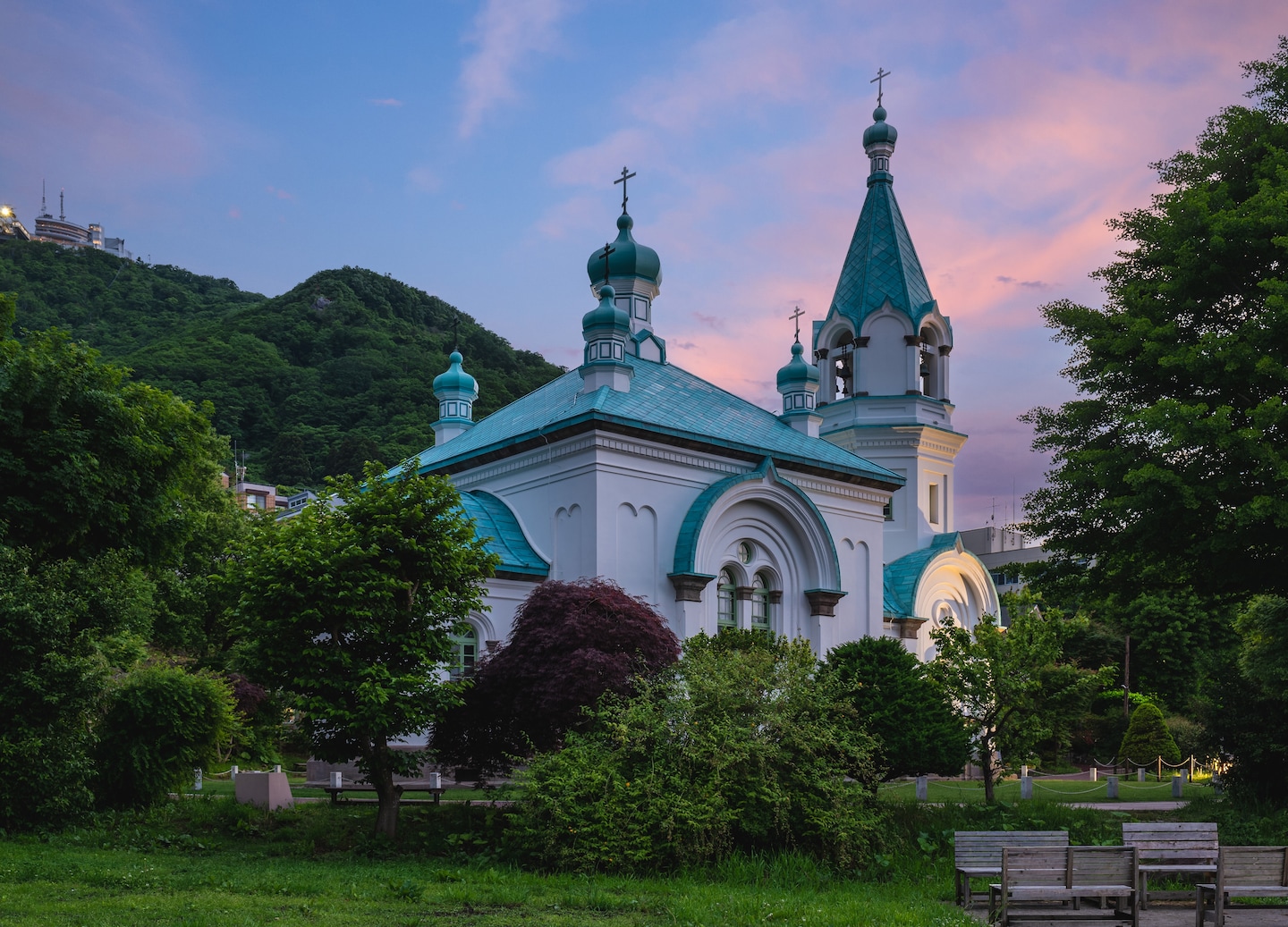 Hakodate’s Orthodox Church rises above greenery.. - Hakodate, Japan