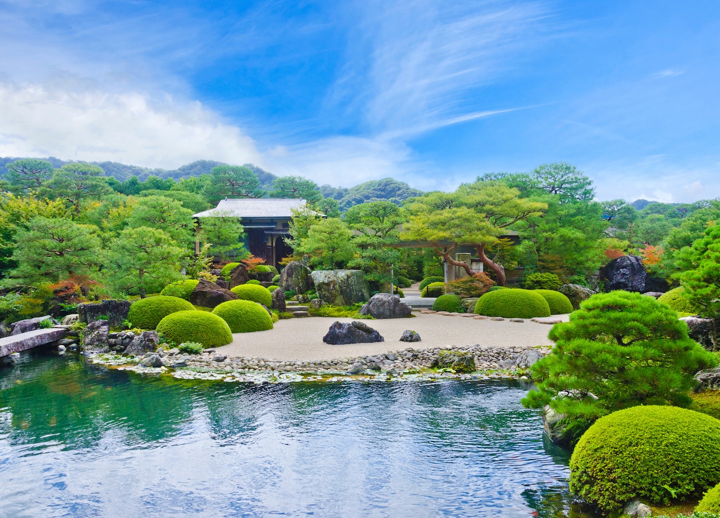 Adachi Garden’s sculpted pines and raked gravel create a tranquil, museum‑like landscape. - Sakaiminato, Japan