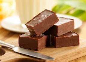 chocolate fudge squares tempting stack