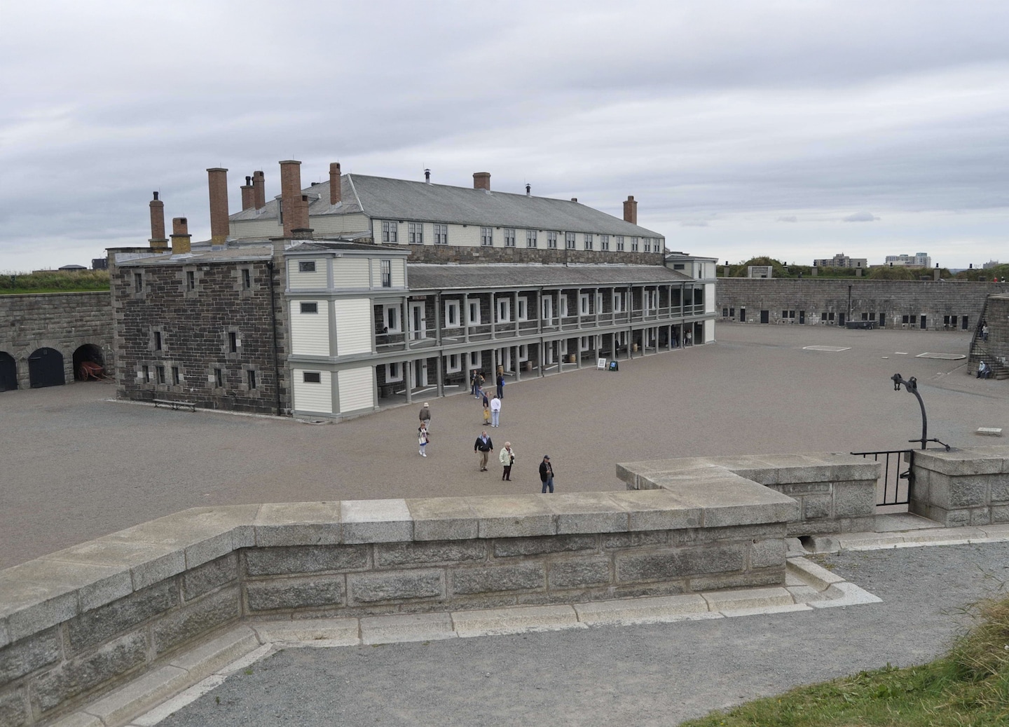 Halifax Citadel’s stone fort walls rise above the hilltop, overlooking the city and harbor below. - Halifax, Nova Scotia