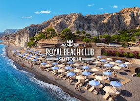 royal beach club santorini hero text lowered