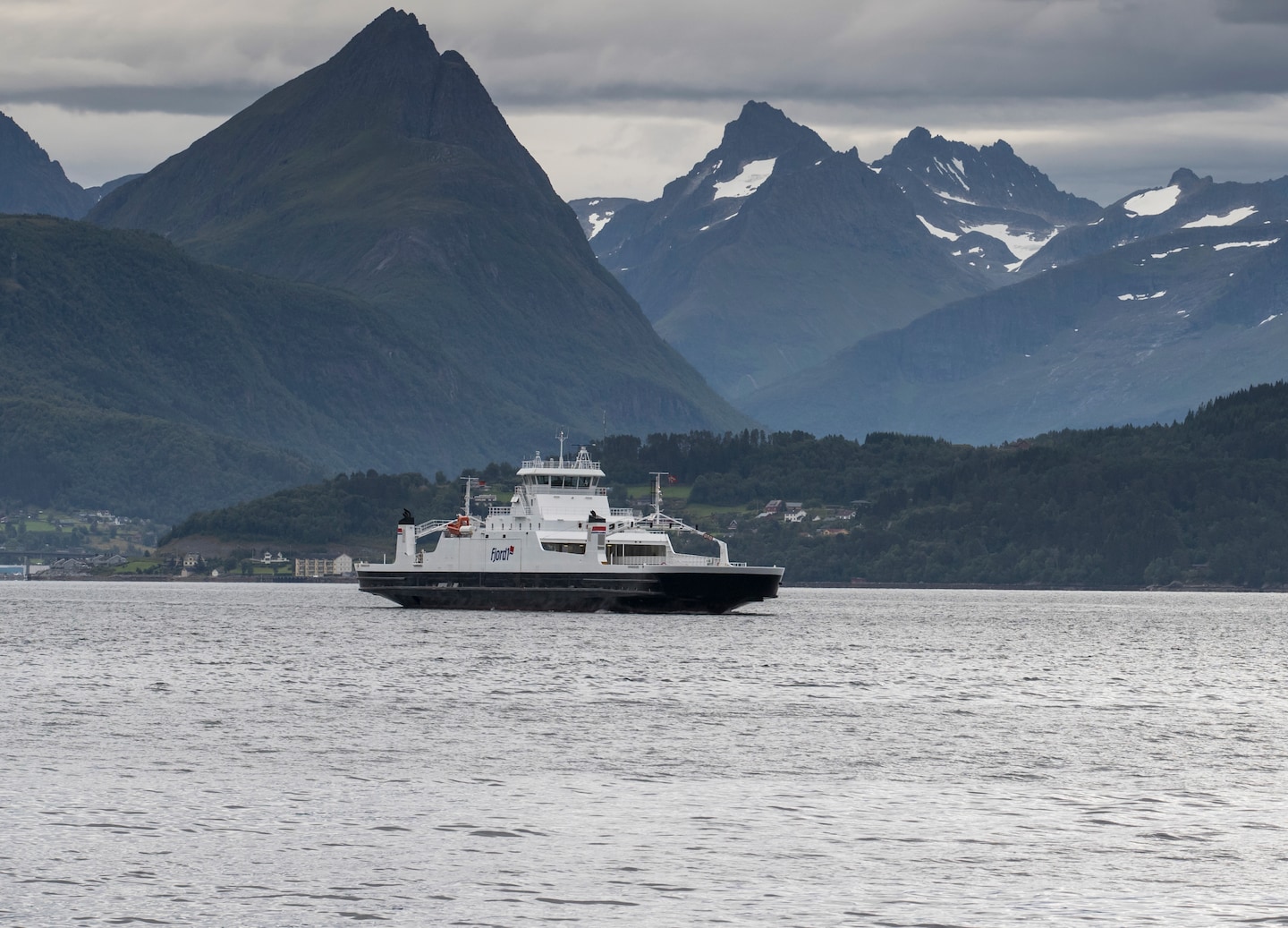 Autumn results in colorful leaves, fewer crowds, fresh seafood, and scenic drives along fjords and Atlantic roads. - Ålesund, Norway 