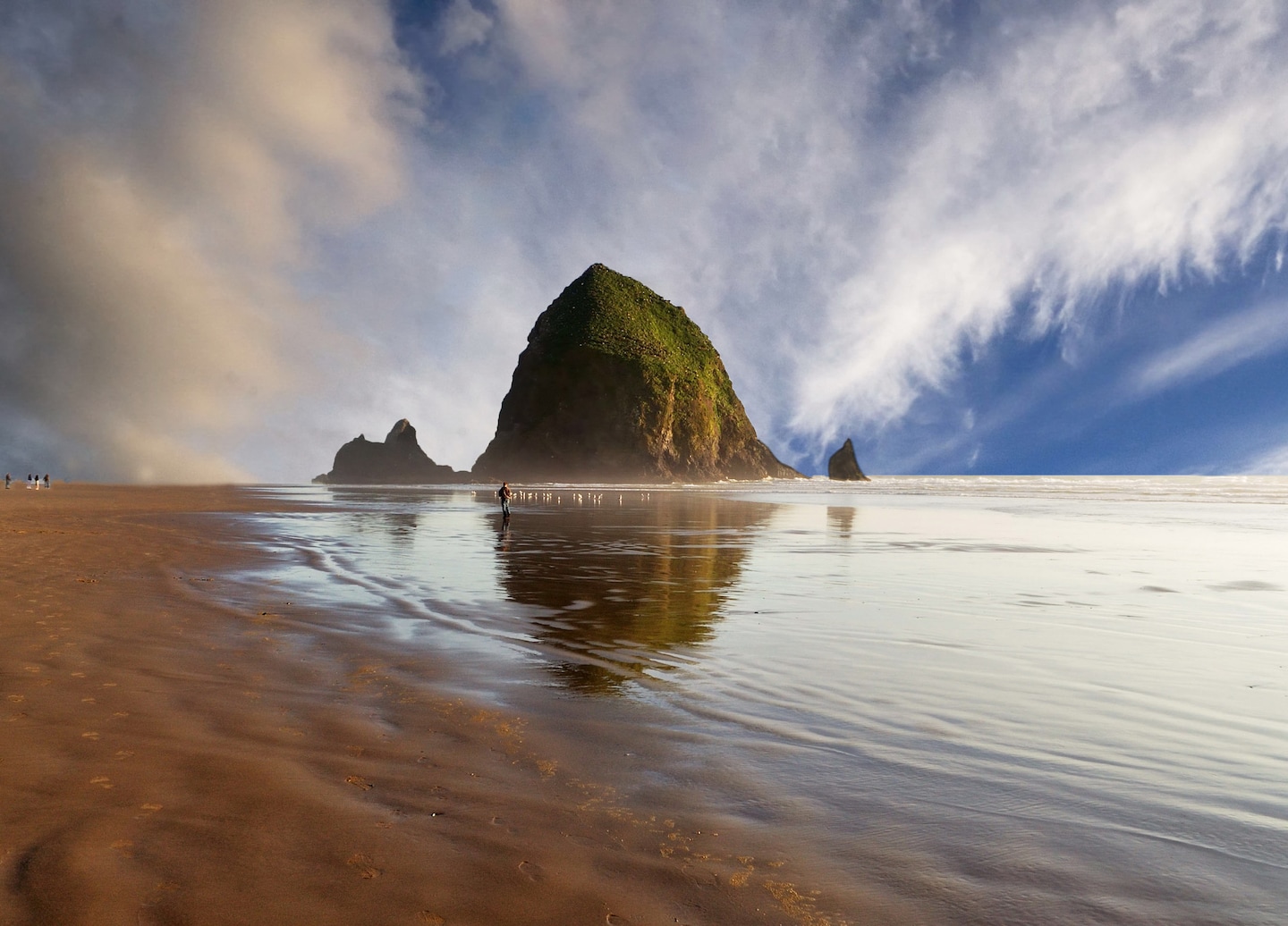 Haystack Rock rises above Cannon Beach’s shoreline. - Astoria, Oregon