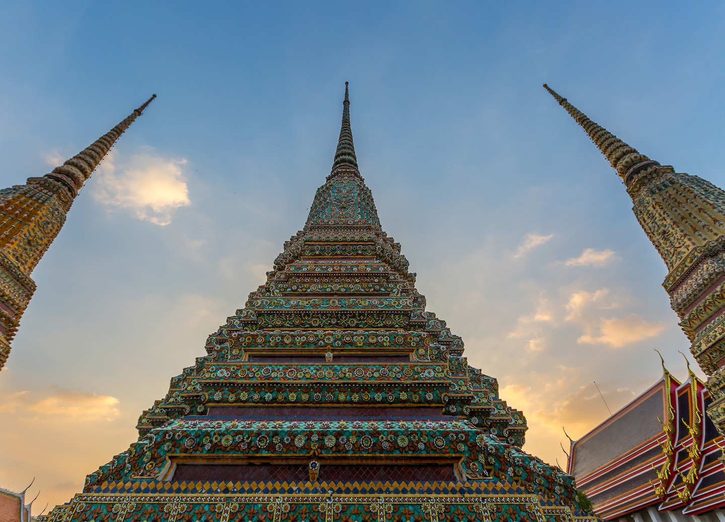 Wat Pho Temple is the home to the massive Reclining Buddha and gorgeous murals.