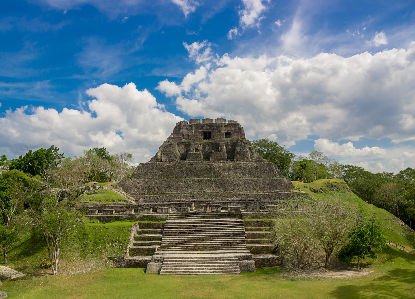 Climb Xunantunich’s Maya temple, enjoy local crafts, and savor a traditional Belizean lunch. - Belize City, Belize