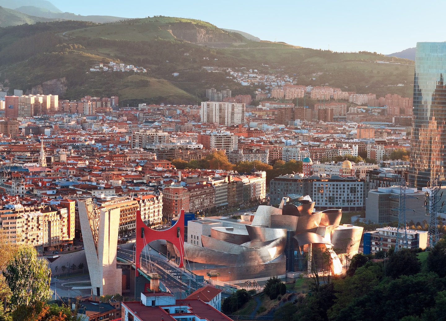 Bilbao’s skyline featuring modern architecture, including the Guggenheim. - Bilbao, Spain