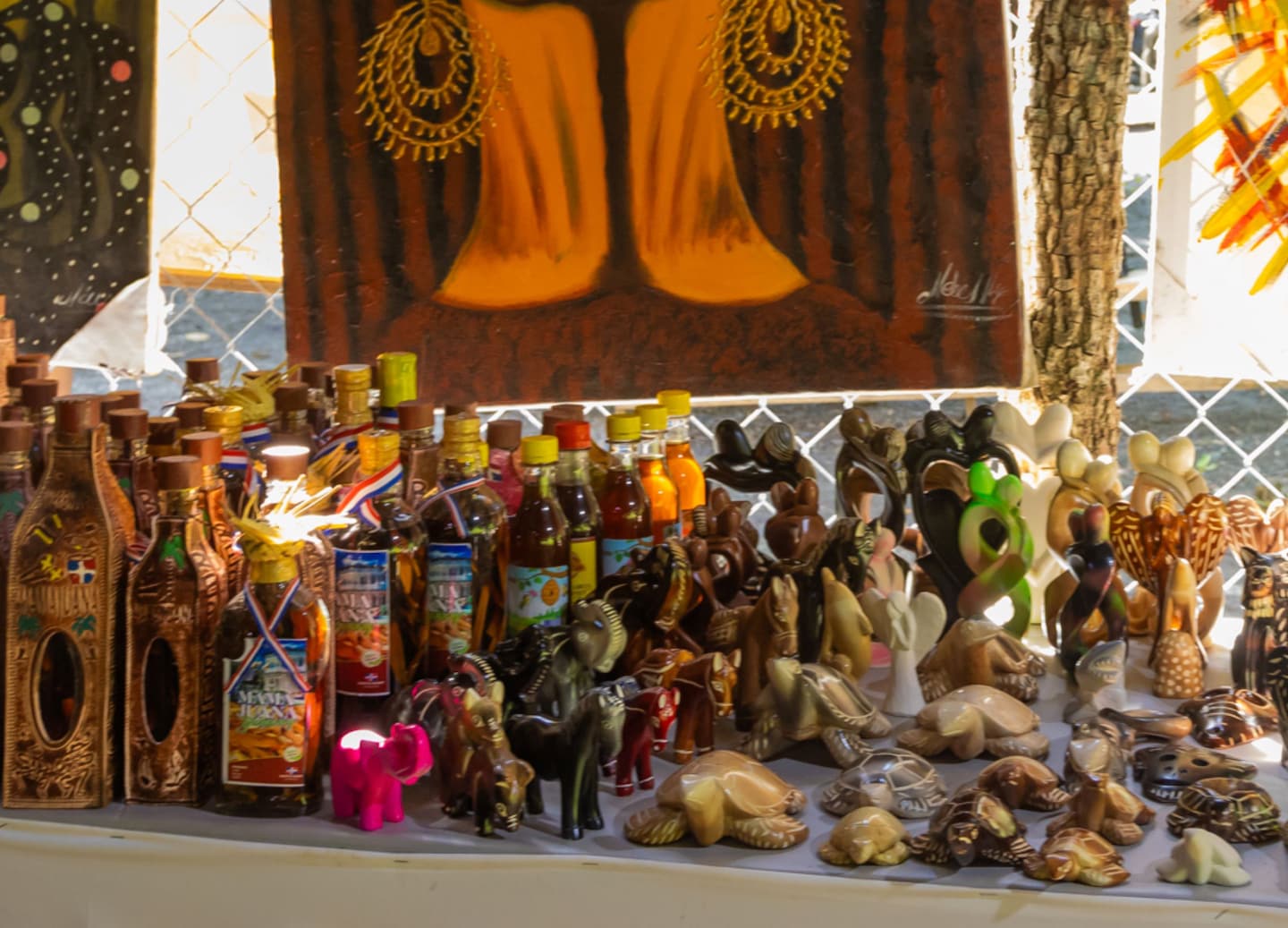 A local vendor’s shop displays colorful Dominican crafts, snacks, and handmade goods for visitors. - Cabo Rojo, Dominican Republic