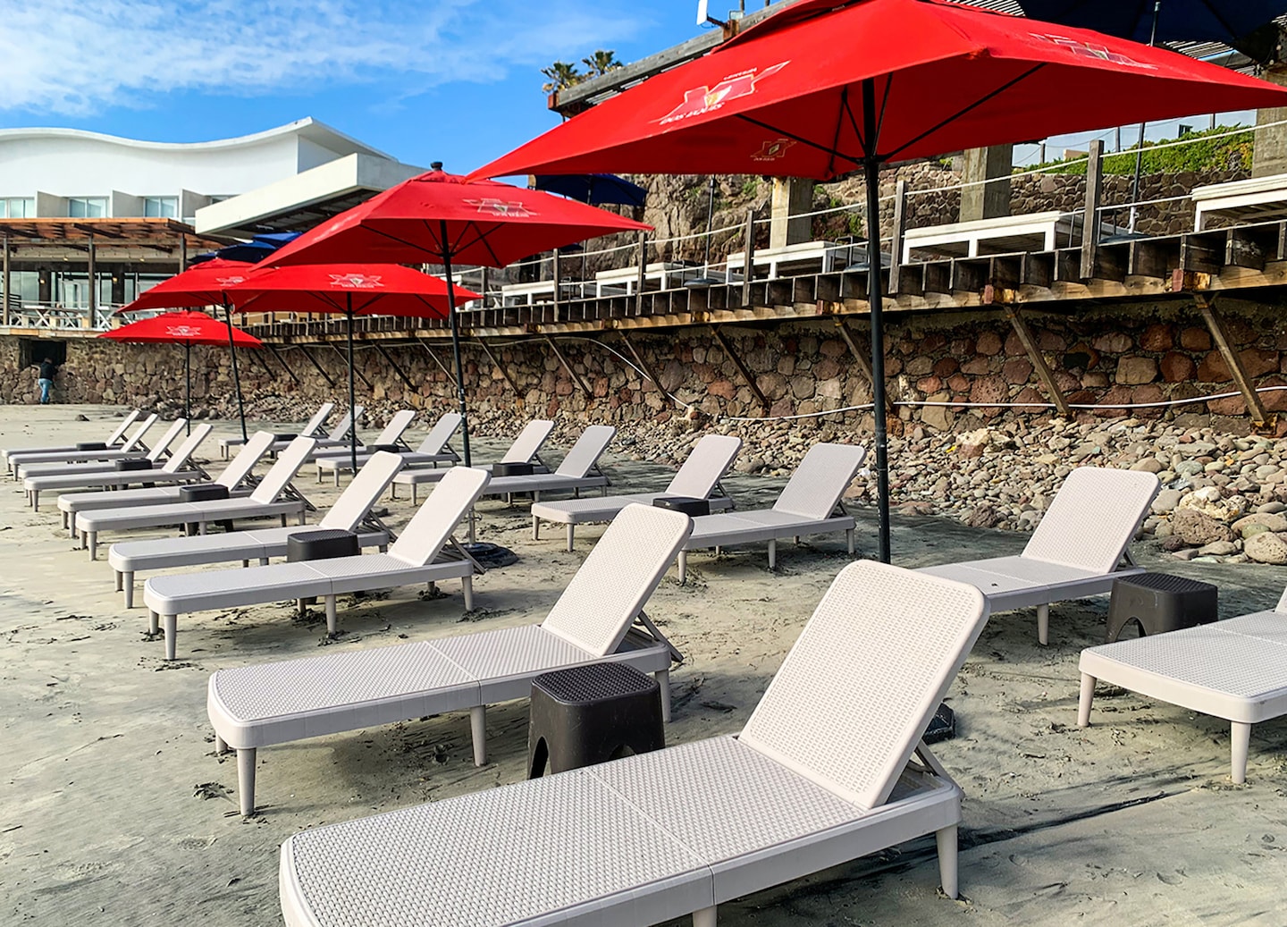 Beach chairs face the ocean at Rosarito Beach. - Ensenada, Mexico 