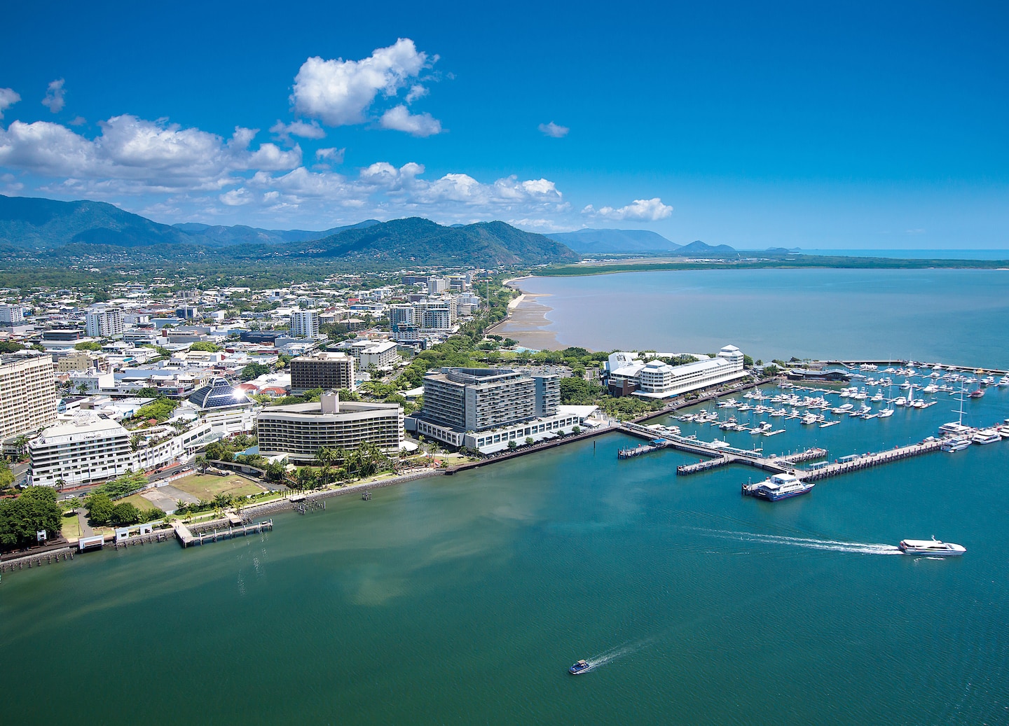 Aerial view above Cairns and blue waters.