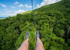 woman zipline jungle canopy
