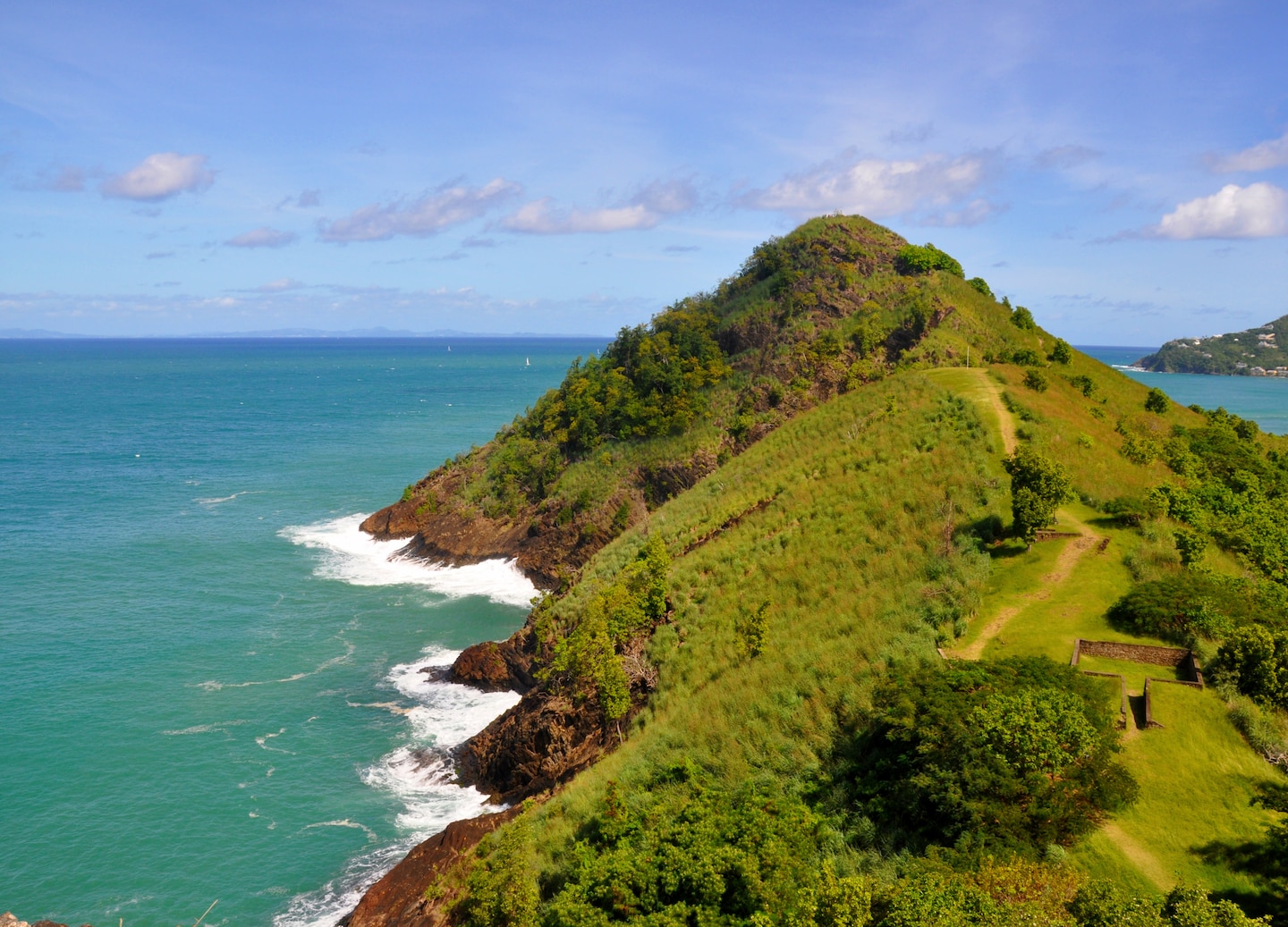 Pigeon Island’s rocky peninsula meets calm turquoise waters. - Castries, St. Lucia