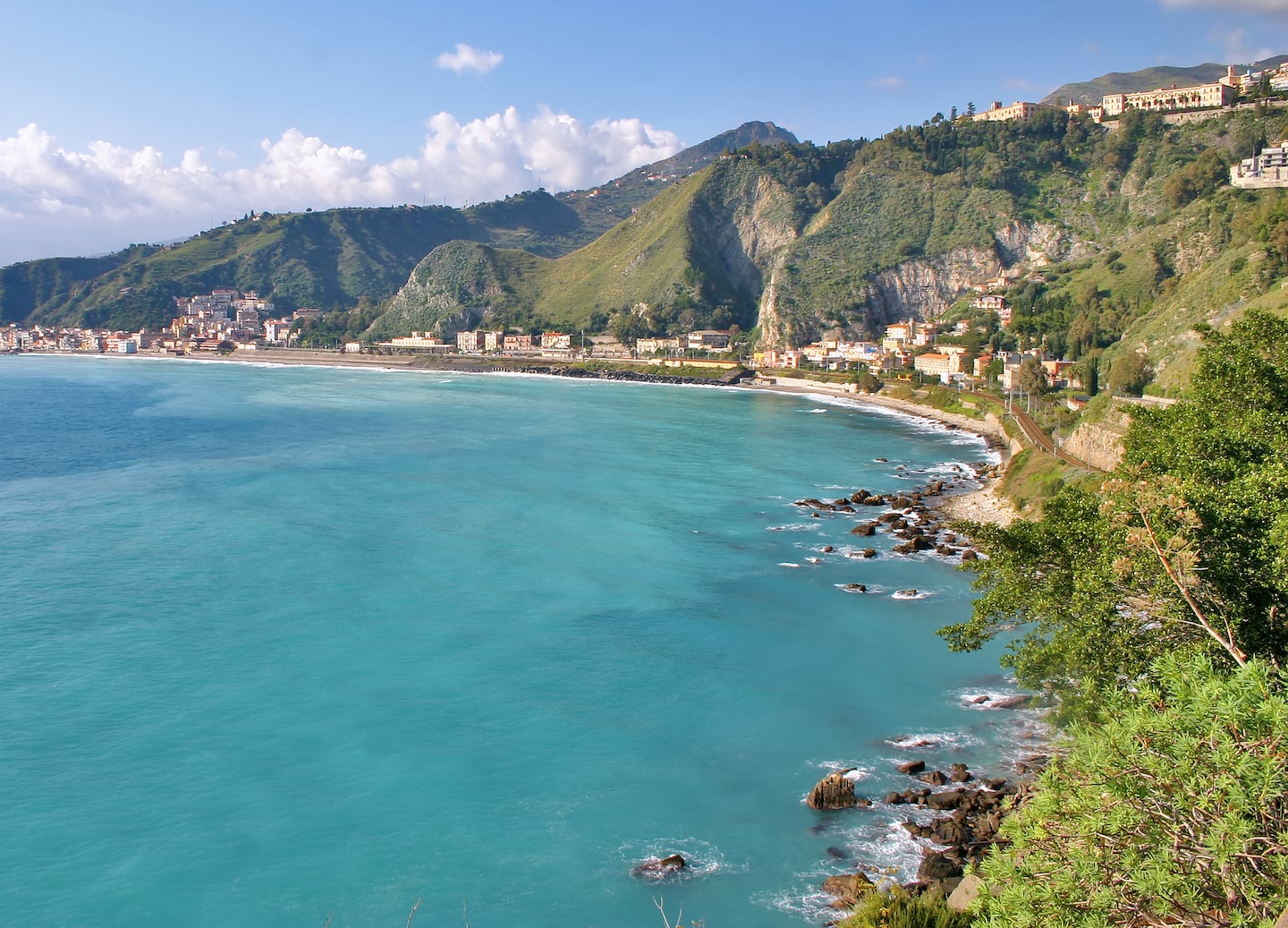 Shop Sicilian ceramics, wines, lava stone jewelry, and sweets to cherish the island’s culture and craft. - Sicily (Messina), Italy