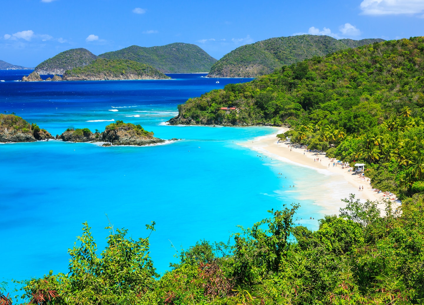 Discover St. John’s natural beauty, from tropical forests to tranquil Cruz Bay’s scenic seaside charm. - Charlotte Amalie, St. Thomas
