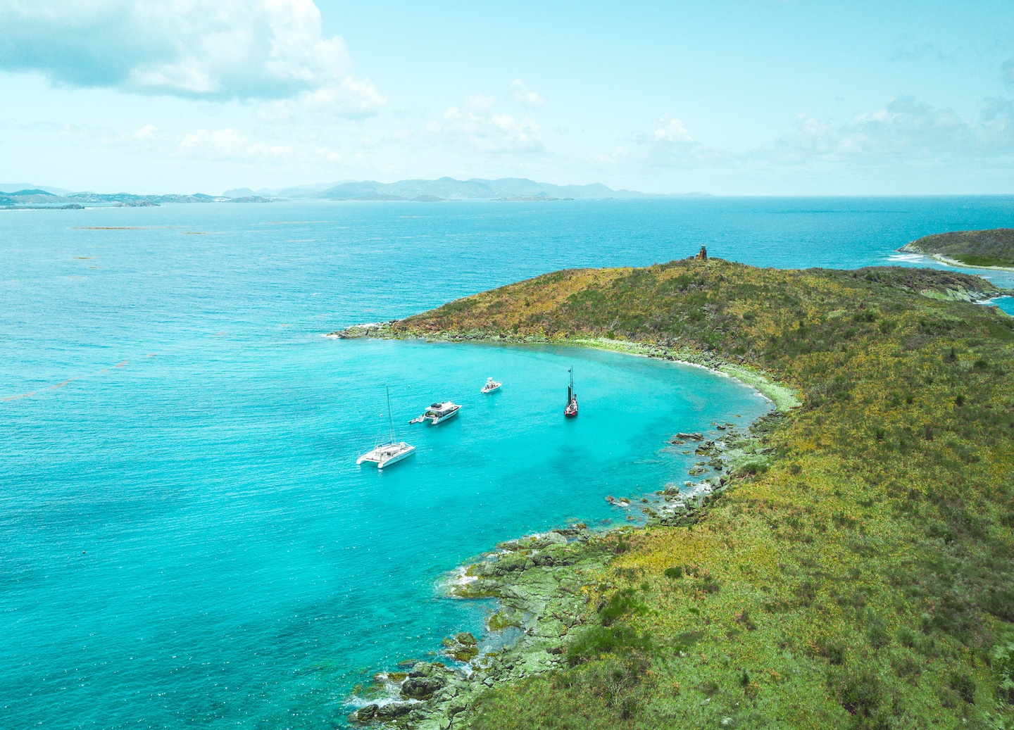 Sail and snorkel Christmas Cove’s vibrant reefs, encountering turtles, rays and stunning coastal scenery. - Charlotte Amalie, St. Thomas