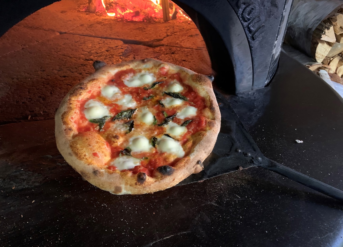 A freshly made Neapolitan pizza. - Naples, Italy
