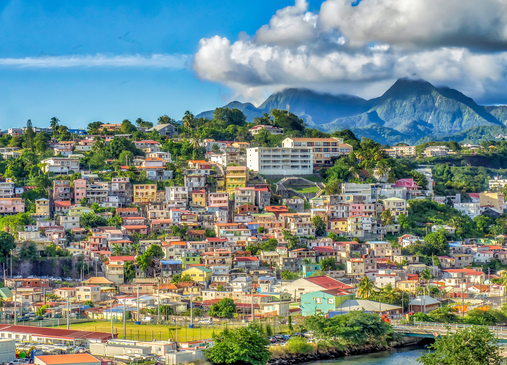 view from the sea of houses on hillsides in fort de france capital city of martinique an