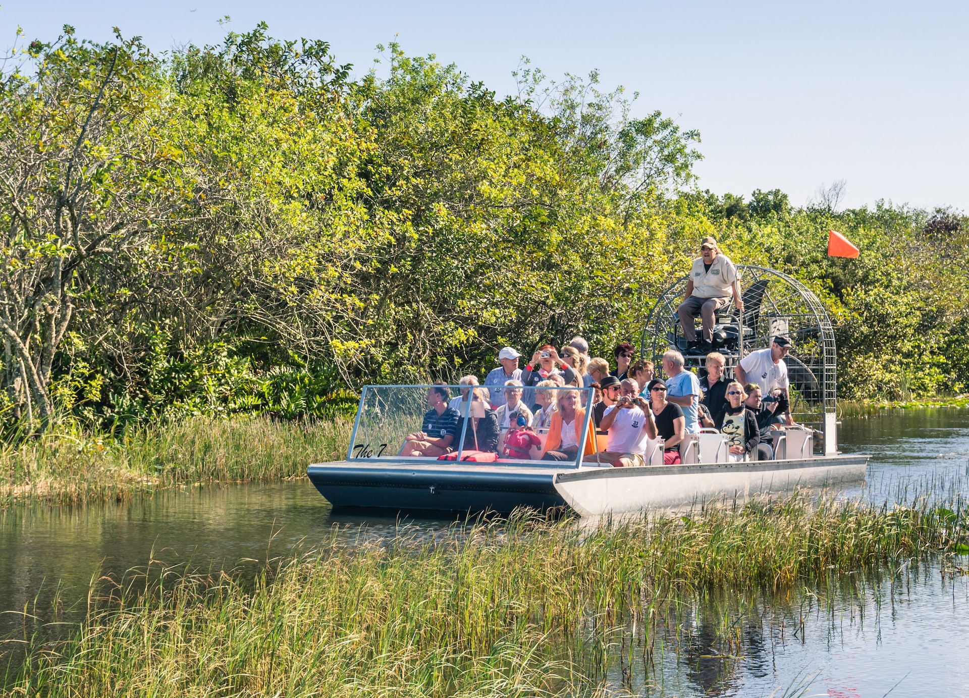 group riding airboat everglades