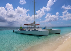 Snorkel Sip and Sail Boat Docked
