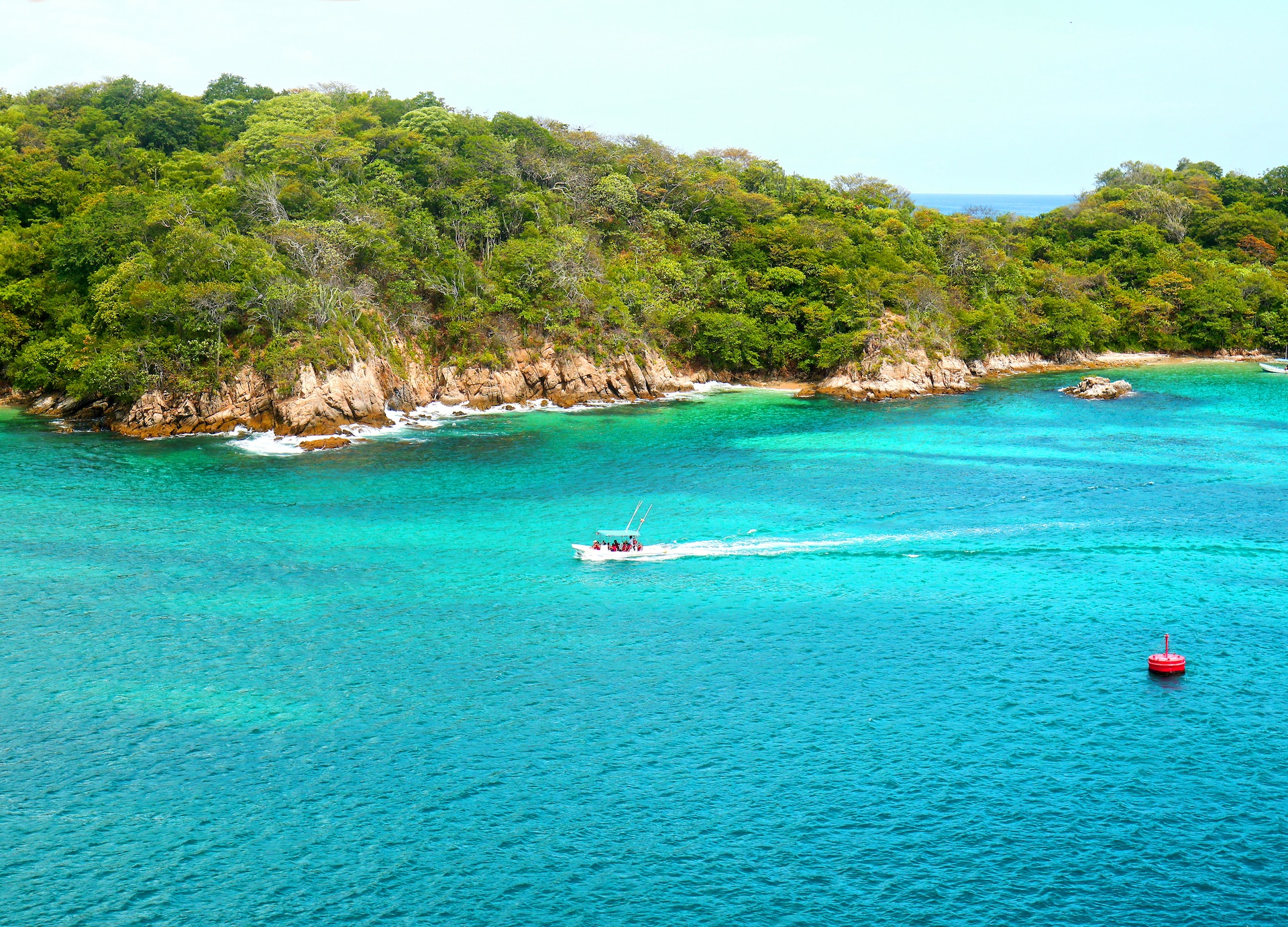 aerial santa cruz bay huatulco boat