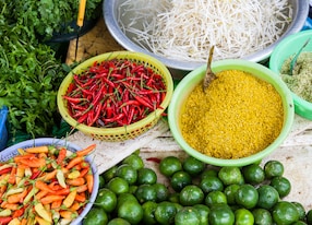 fresh vegetables and spices at vietnamese street market vietnam
