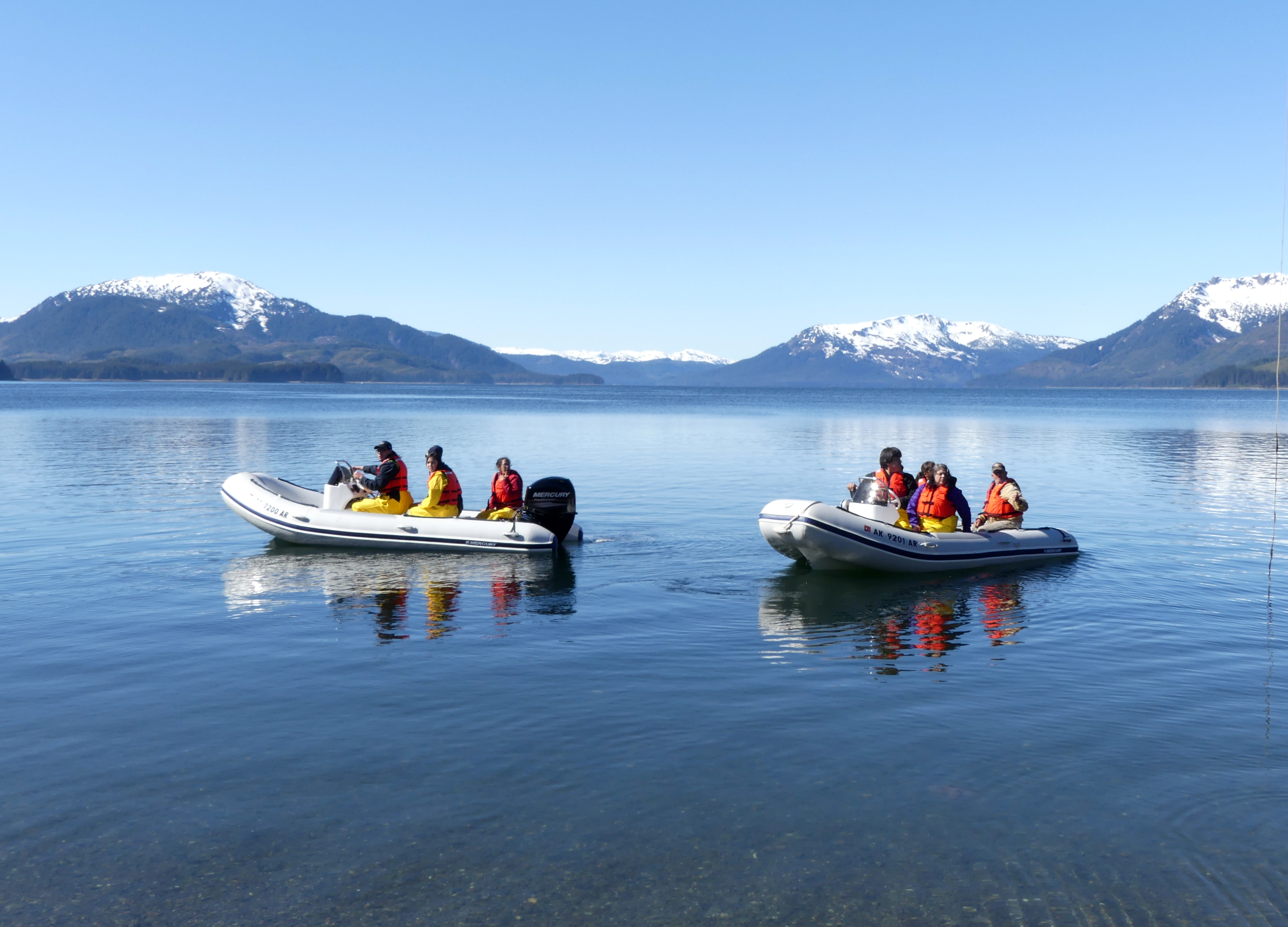 boats-in-cold-ocean-near-