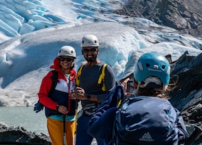 edge of glacier guests getting photo