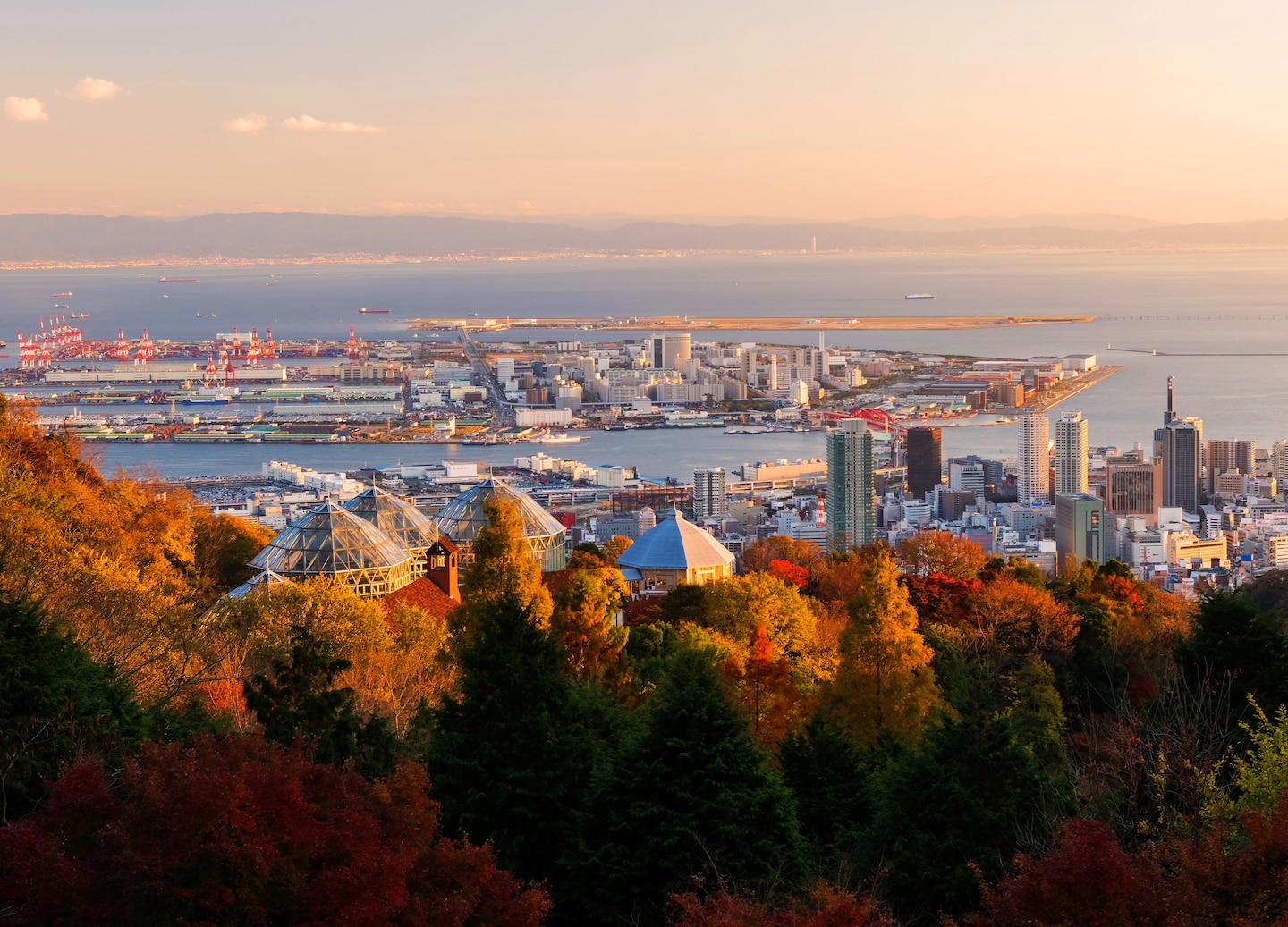 Kobe’s Nunobiki Herb Garden spreads across green hills, with ropeway gondolas overlooking the city below. - Kobe, Japan