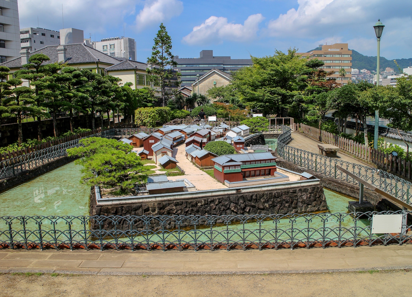 Historic Dejima’s waterfront buildings line the canal, reflecting Nagasaki’s preserved Edo‑period trading port. - Nagasaki, Japan