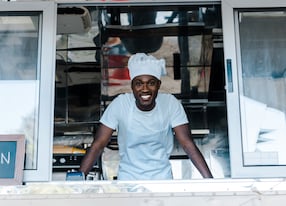 male chef black food truck