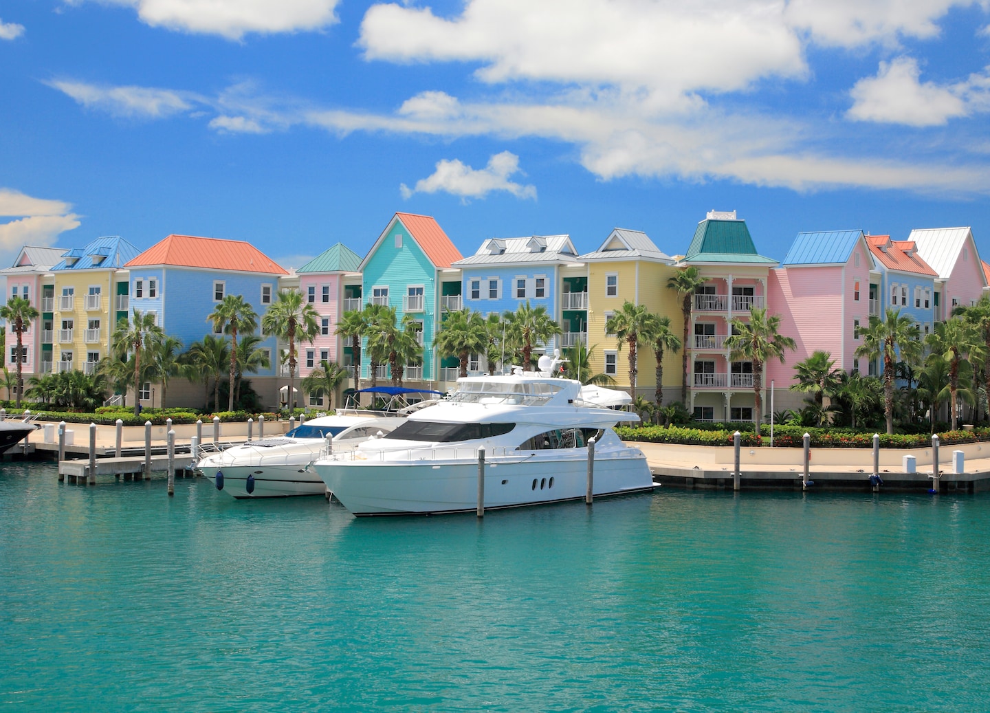 Atlantis Resort rises above Paradise Island, with its iconic coral‑colored towers overlooking the blue shoreline. - Nassau, Bahamas