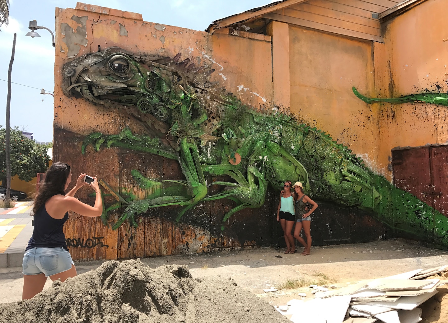 Walking Oranjestad reveals colorful streets, shops, murals, hidden courtyards, and scenic beach sunsets. - Aruba