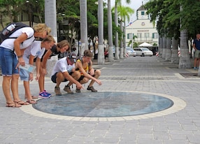 people family in front of courthouse in st maarten philipsburg treasure hunt searching for clues